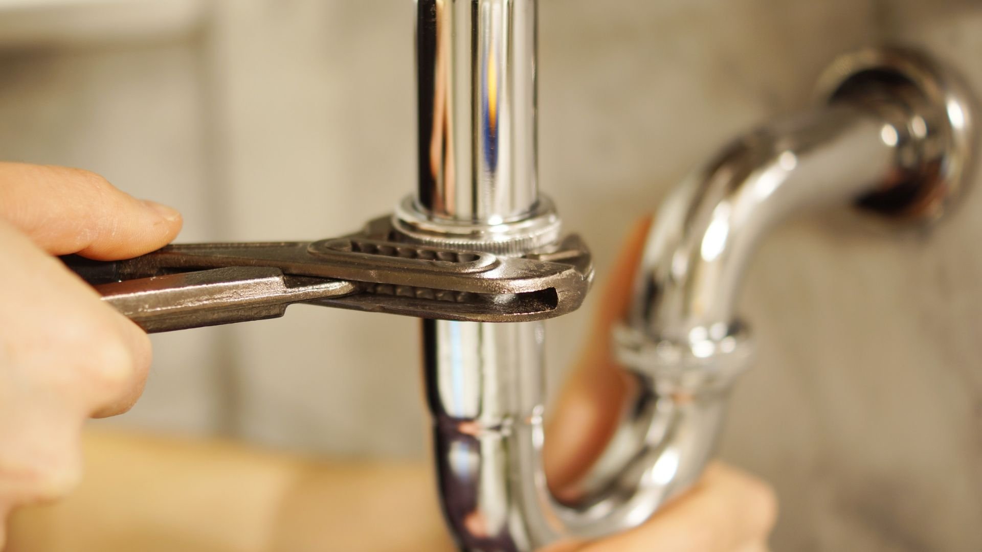 Licensed plumber performing a general plumbing repair